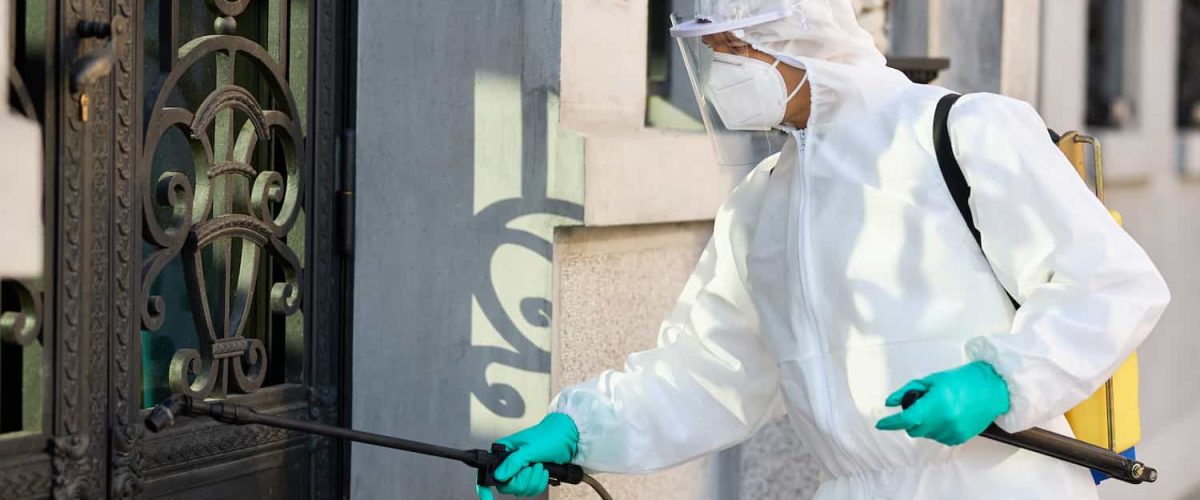 healthcare-worker-disinfecting-contaminated-city